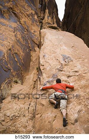 Man climbing mountain View Large Photo Image Stock Image - Man climbing mountain. Fotosearch