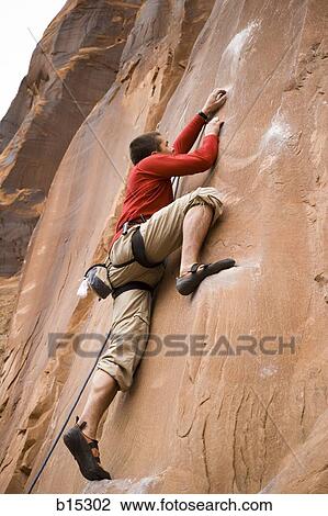 Man climbing mountain View Large Photo Image Stock Image - Man climbing mountain. Fotosearch