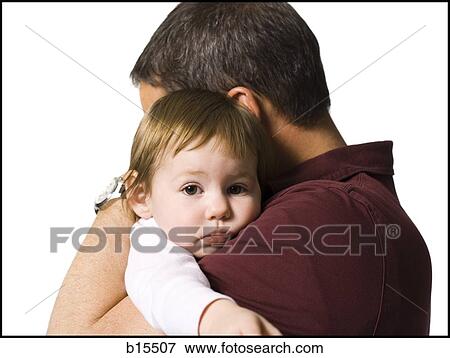 Man hugging baby girl View Large Photo Image Stock Photo - Man hugging baby girl. Fotosearch