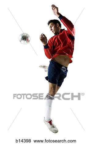 Man kicking soccer ball View Large Photo Image Stock Photo - Man kicking soccer ball. Fotosearch