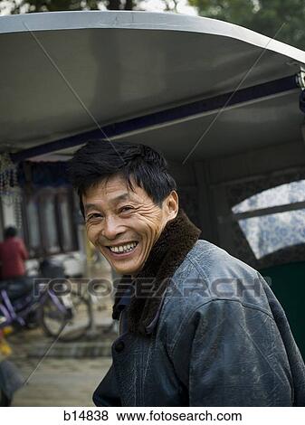 Man outdoors smiling View Large Photo Image Stock Photo - Man outdoors smiling. Fotosearch