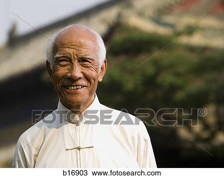 Man smiling outdoors View Large Photo Image Stock Image - Man smiling outdoors. Fotosearch