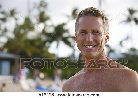 Man smiling outdoors View Large Photo Image Stock Photograph - Man smiling outdoors. Fotosearch