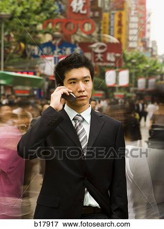 Man with a cell phone. View Large Photo Image Stock Photo - Man with a cell phone.. Fotosearch