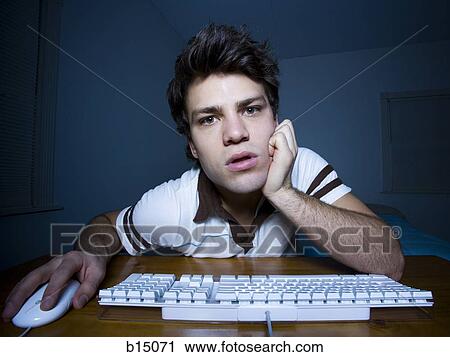 Man with hand on mouse and keyboard watching View Large Photo Image Stock Image - Man with hand on mouse and keyboard watching. Fotosearch