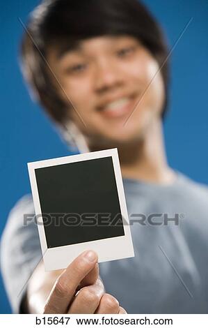 Man with instant camera photo blank View Large Photo Image Stock Photo - Man with instant camera photo blank. Fotosearch