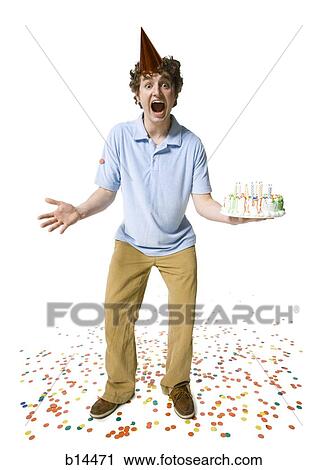 Man with party hat holding birthday cake View Large Photo Image Stock Image - Man with party hat holding birthday cake. Fotosearch