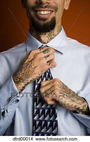 Man with tattoos in shirt and tie smiling View Large Photo Image Picture - Man with tattoos in shirt and tie smiling. Fotosearch
