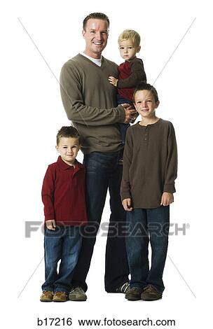 Man with three boys smiling View Large Photo Image Stock Photograph - Man with three boys smiling. Fotosearch