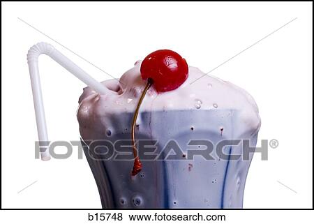 Melting milkshake with straw and cherry View Large Photo Image Stock Photo - Melting milkshake with straw and cherry. Fotosearch