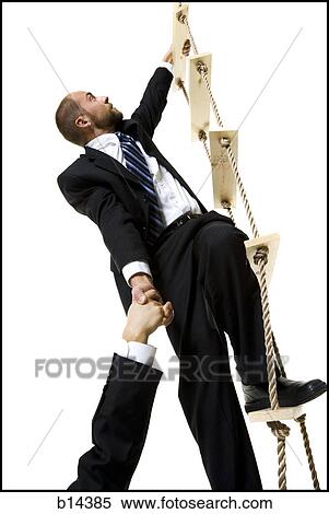 Men climbing up a ladder. View Large Photo Image Stock Photography - Men climbing up a ladder.. Fotosearch
