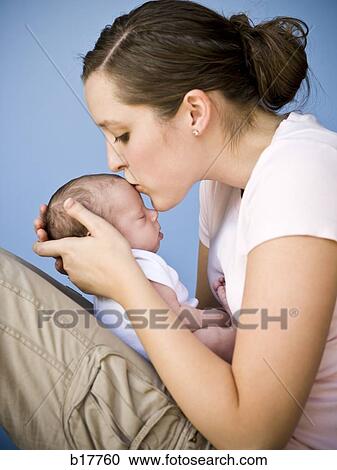 Mother holding newborn baby. View Large Photo Image Stock Image - Mother holding newborn baby.. Fotosearch