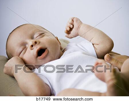 Mother holding Newborn baby. View Large Photo Image Stock Photo - Mother holding Newborn baby.. Fotosearch