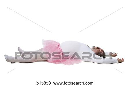 Stock Image - Obese man in tutu lying down. Fotosearch