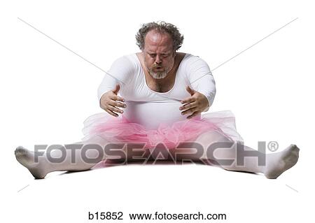 Obese man in tutu sitting and reaching forward View Large Photo Image Stock Image - Obese man in tutu sitting and reaching forward. Fotosearch