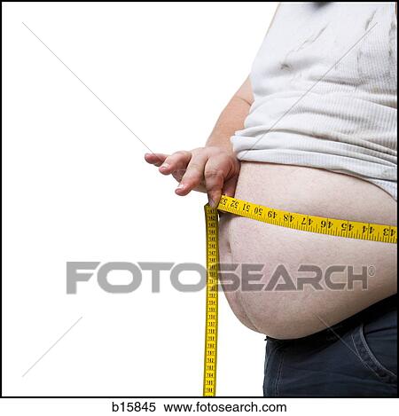 Obese man measuring waist with tape measure View Large Photo Image Stock Photography - Obese man measuring waist with tape measure. Fotosearch