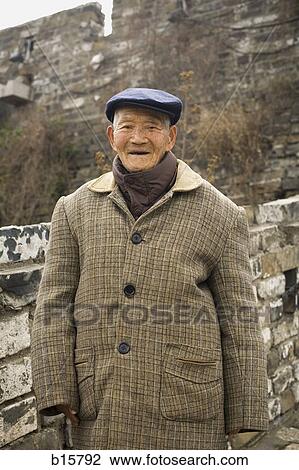 Old man with hat standing outdoors View Large Photo Image Stock Image - Old man with hat standing outdoors. Fotosearch
