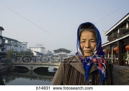 Older woman with head scarf outdoors View Large Photo Image Stock Image - Older woman with head scarf outdoors. Fotosearch