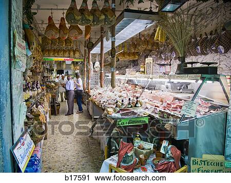 Stock Image - Outdoor meat market in Italy. Fotosearch