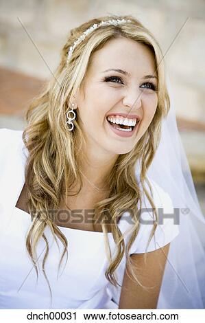 Portrait of a bride with veil smiling View Large Photo Image Stock Image - Portrait of a bride with veil smiling. Fotosearch