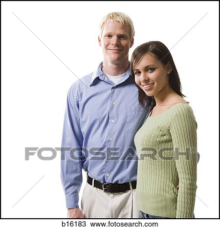 Portrait of a couple smiling View Large Photo Image Stock Image - Portrait of a couple smiling. Fotosearch