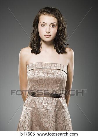 Stock Photography - Portrait of a teenage girl standing. Fotosearch
