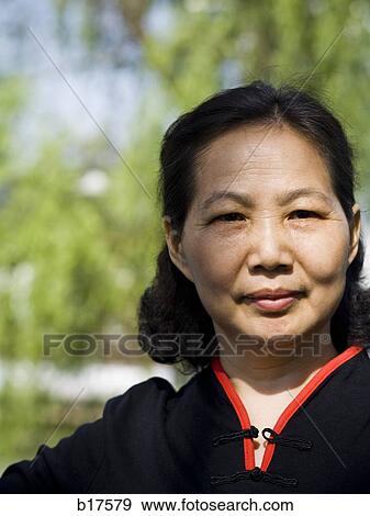 Portrait of a woman outdoors View Large Photo Image Stock Photo - Portrait of a woman outdoors. Fotosearch