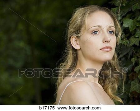Stock Photography - Portrait of a woman outdoors. Fotosearch