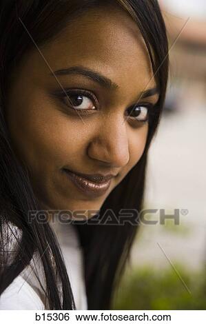 Portrait of a woman smiling View Large Photo Image Stock Photograph - Portrait of a woman smiling. Fotosearch