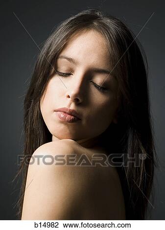 Portrait of a woman with bare shoulders and closed eyes View Large Photo Image Stock Image - Portrait of a woman with bare shoulders and closed eyes. Fotosearch