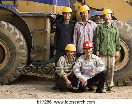 Portrait of five construction workers outdoors View Large Photo Image Stock Photograph - Portrait of five construction workers outdoors. Fotosearch