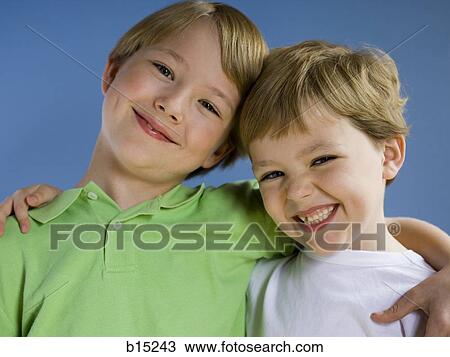 Portrait of two boys smiling View Large Photo Image Stock Image - Portrait of two boys smiling. Fotosearch