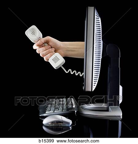 Profile of computer with hand from monitor holding telephone receiver View Large Photo Image Stock Photo - Profile of computer with hand from monitor holding telephone receiver. Fotosearch