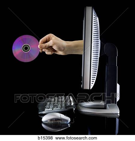 Profile of computer with hand holding CD from monitor View Large Photo Image Stock Photo - Profile of computer with hand holding CD from monitor. Fotosearch