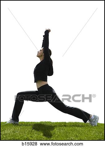 Profile of woman stretching outdoors View Large Photo Image Stock Photo - Profile of woman stretching outdoors. Fotosearch