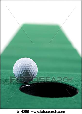 Stock Photography - putting green with golf ball. Fotosearch
