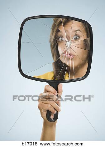Reflection of woman in broken mirror View Large Photo Image Stock Photo - Reflection of woman in broken mirror. Fotosearch