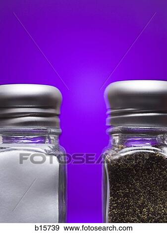 Stock Photo - Salt and pepper shakers close-up. Fotosearch