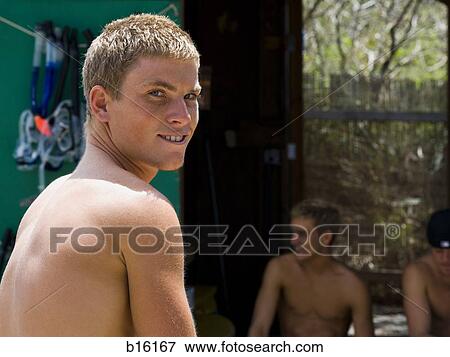 Shirtless man outdoors sitting and smiling View Large Photo Image Stock Photo - Shirtless man outdoors sitting and smiling. Fotosearch