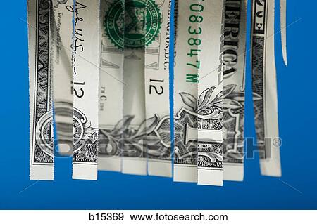 Shredded one dollar bill American currency View Large Photo Image Stock Photo - Shredded one dollar bill American currency. Fotosearch