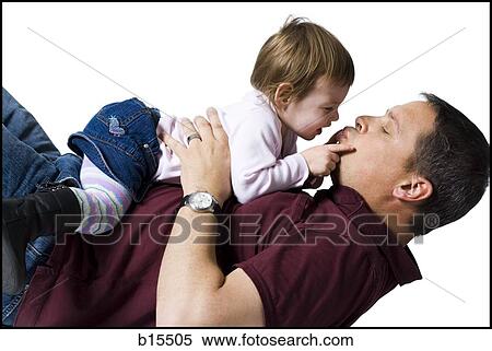 Side profile of man with baby girl snuggling View Large Photo Image Stock Photography - Side profile of man with baby girl snuggling. Fotosearch