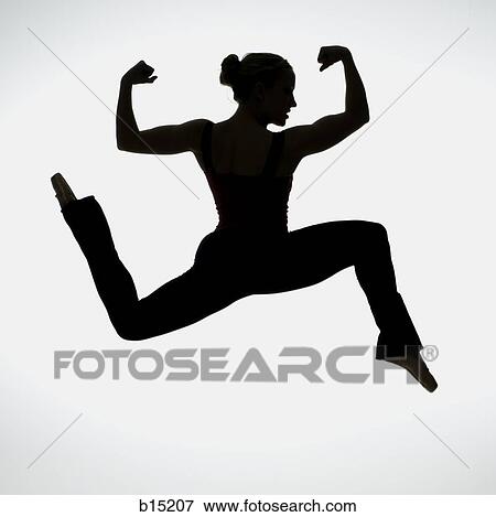 Side profile silhouette of female dancer flexing muscles View Large Photo Image Stock Photo - Side profile silhouette of female dancer flexing muscles. Fotosearch