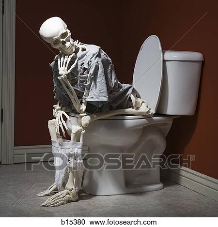 Skeleton on toilet with shredded clothing View Large Photo Image Stock Image - Skeleton on toilet with shredded clothing. Fotosearch