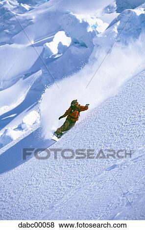 Snowboarder on mountain snowboarding View Large Photo Image Stock Photo - Snowboarder on mountain snowboarding. Fotosearch