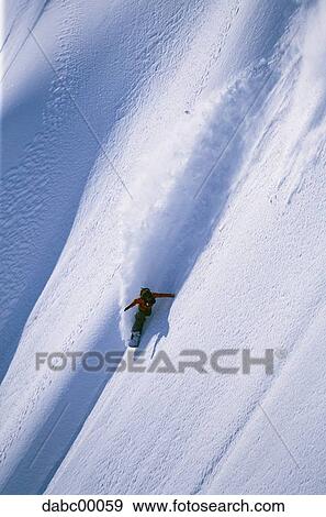 Snowboarder on mountain snowboarding View Large Photo Image Stock Photo - Snowboarder on mountain snowboarding. Fotosearch