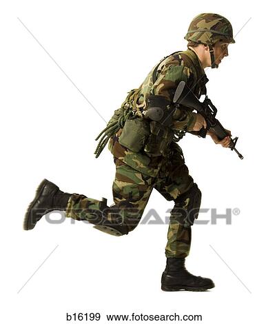 Soldier in uniform with gun running View Large Photo Image Stock Photo - Soldier in uniform with gun running. Fotosearch