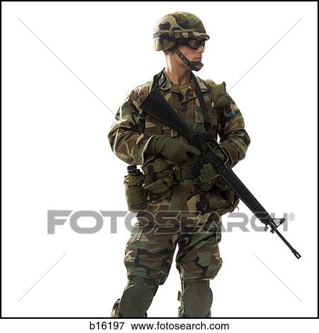 Soldier in uniform with gun View Large Photo Image Stock Photo - Soldier in uniform with gun. Fotosearch