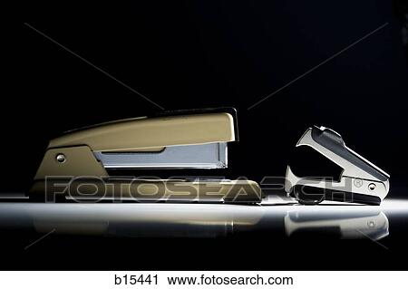 Stock Image - Staple remover and stapler. Fotosearch