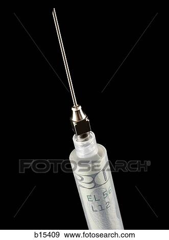 Syringe with twenty dollar bill View Large Photo Image Stock Photo - Syringe with twenty dollar bill. Fotosearch