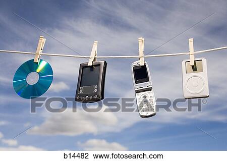 Technology on clothesline View Large Photo Image Stock Image - Technology on clothesline. Fotosearch